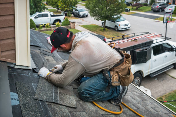 Professional Roofing technician working in North Weymouth, MA